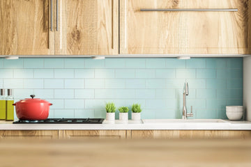 Designers Embrace Salma Hayek's Natural Wood Cabinetry as 2025's Top Kitchen Trend